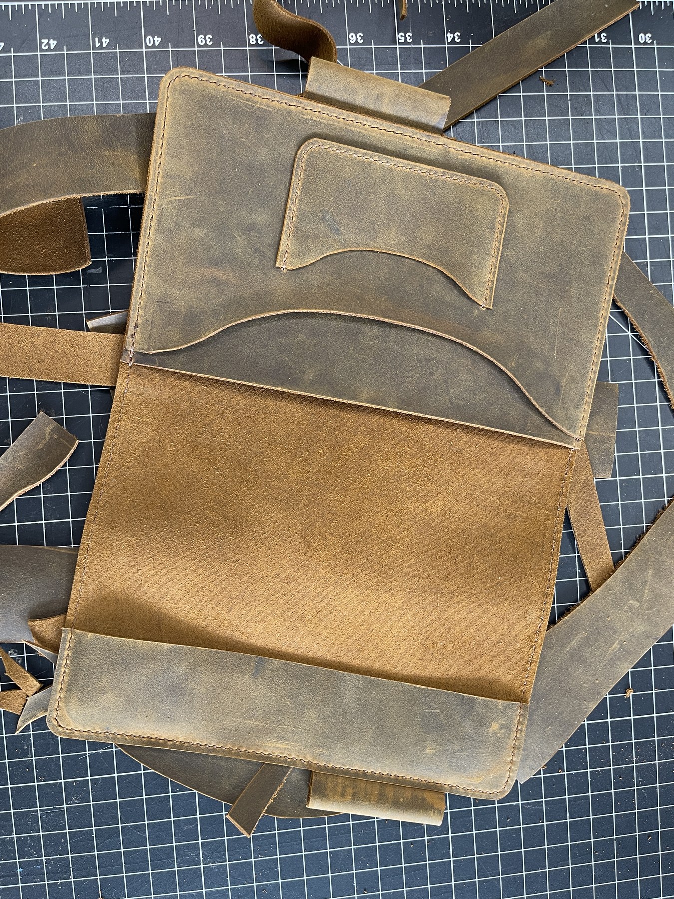Bag panels cut, holes punched, ready to stitch.